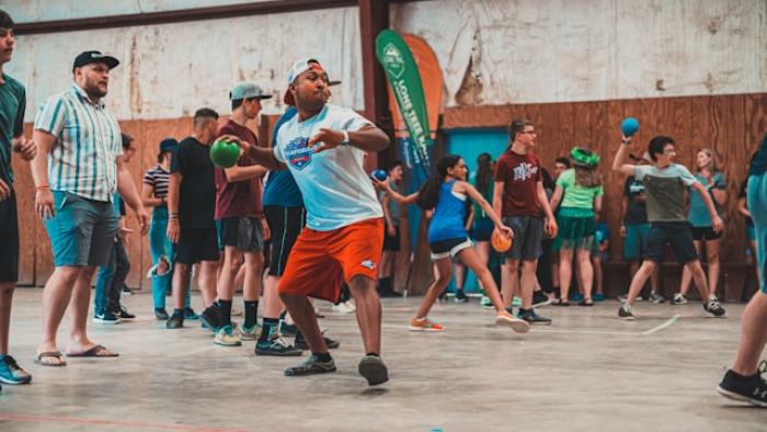 A group of people playing dodgeball